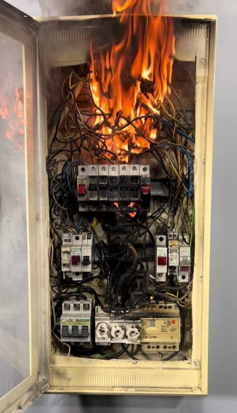 The fire doesn't start in your living room. It starts in a metal box nobody opens.